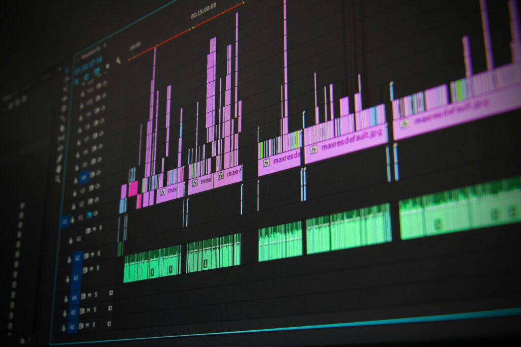 pexels-photo-257904-257904 Close-up of a professional audio and video editing software interface with waveform displays.